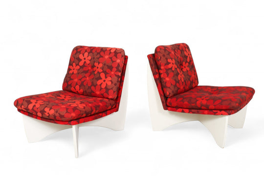 PAIR OF SPACE AGE LOUNGE CHAIRS IN RED FLORAL UPHOLSTERY