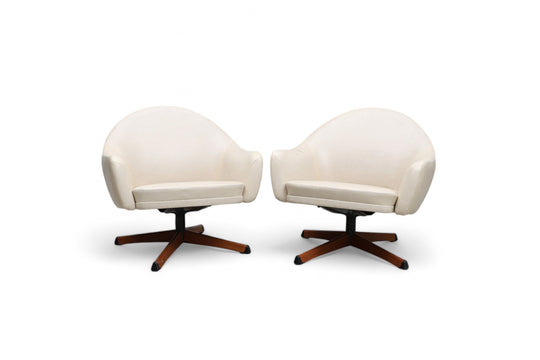 PAIR OF DANISH MODERN SWIVEL POD CHAIRS