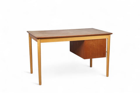 Side view of writing desk legs and underside construction for teak desk