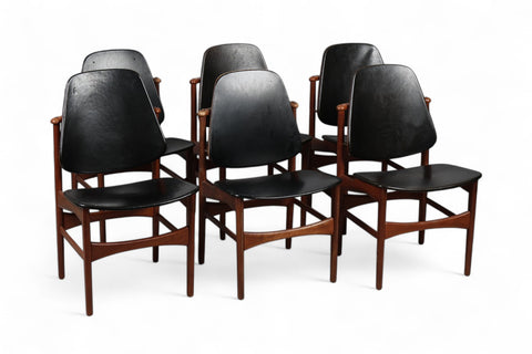 Arne Hovmand Olsen teak dining chairs set displayed