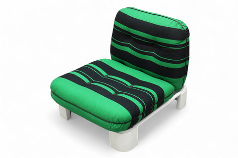 Vintage armchair in teak designed with organic lines