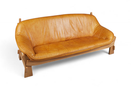 1970s MAISON REGAIN THREE SEAT SOFA IN COGNAC LEATHER
