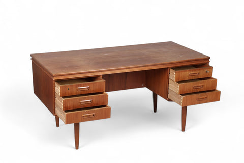 Vintage Scandinavian teak desk with clean, modern lines