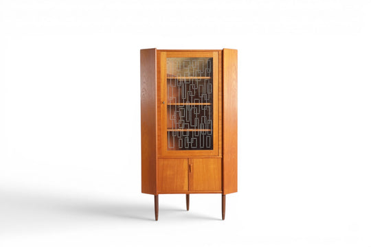 ATOMIC MID CENTURY CORNER UNIT WITH ASYMMETRICAL ETCHED GLASS DOOR BY OMANN JUN