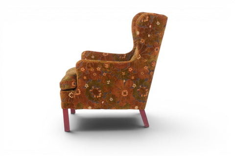 Side profile of OPE Møbler 1960s Swedish wingback lounge chair in original floral cut velvet with burgundy legs