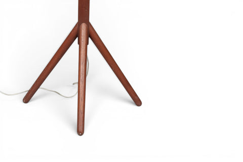 Side view of 1950s Danish solid teak floor speaker on tapered tripod legs