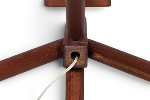 Teak grain detail on 1950s Danish floor speaker enclosure on tripod stand
