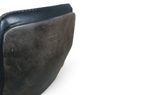 Black leather upholstery detail on Arne Wahl Iversen highback chair — Komfort 1970s
