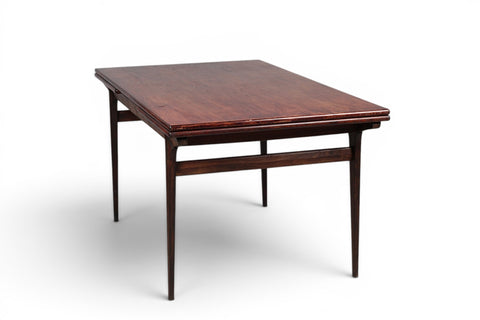Underside draw leaf extension mechanism on Johannes Andersen 1950s Danish rosewood table
