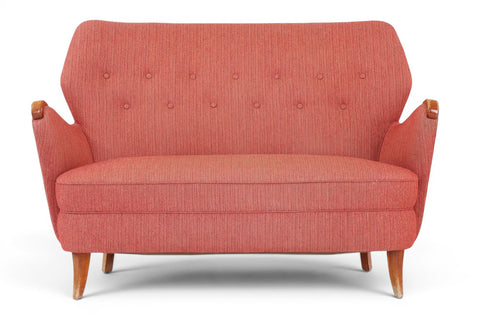 Side profile of 1940s Danish beech loveseat in original copper blush wool upholstery