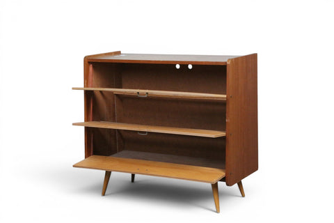 Open interior of 1950s Swedish beech and teak shoe cabinet showing storage shelves