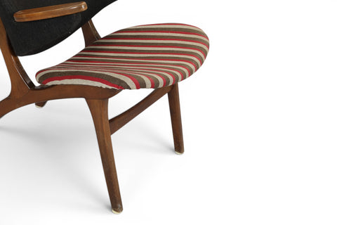 Three quarter view of Carl Edward Matthes Danish beech and wool lounge chair 1960s
