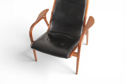 detail of black leather upholstery - 1965 Swedish mid century Lamino armchair