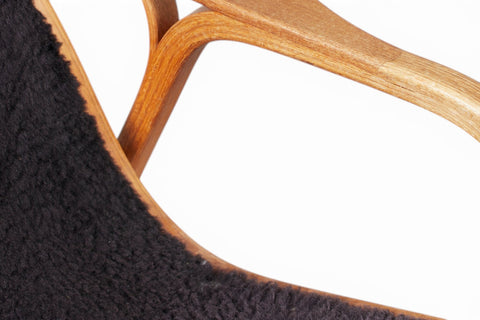 Lamino lounge chair - three-quarter angle with sheepskin upholstery