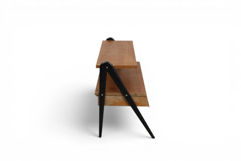 Close-up of black upright joinery on teak shelf - Swedish mid century modern