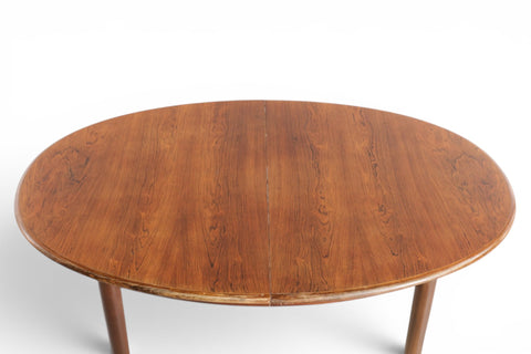 Oval rosewood dining table fully extended with both leaves - 1960s Danish mid century modern