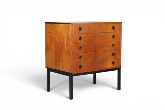 1960S HANS HOVE AND PALLE PEDERSEN TEAK CHEST OF DRAWERS WITH ROSEWOOD HANDLES AND BLACK-LACQUERED METAL LEGS