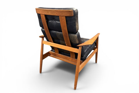 Teak armrest detail on highback chair - 1960s teak leather