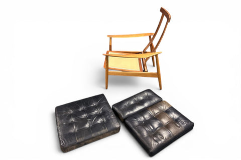 Three-quarter view of armchair and ottoman set - 1960s teak leather