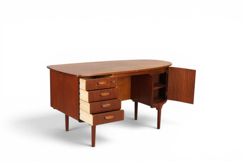 Side profile showing bullet-shaped desk silhouette - 1950s-60s Danish modern