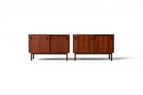 Pair of low 1960s Danish rosewood credenzas, angled view showing grain detail
