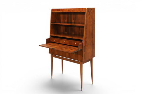 Three-quarter view of Svante Skogh rosewood secretary cabinet — 1950s Swedish modern