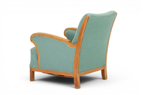Side view of 1940s Danish oak lounge chair in seafoam wool — 1940s Scandinavian modern