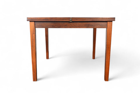 Side profile of solid teak small pedestal table highlighting pedestal base.