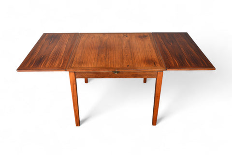 Solid teak small pedestal table with minimalist design.