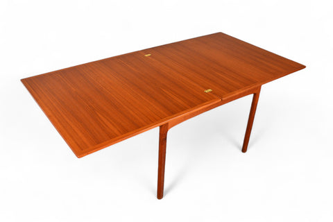Folke Ohlsson flip-top expandable dining table in teak
