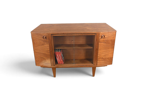 MID CENTURY BOOKCASE WITH ROTATING HIDDEN BAR