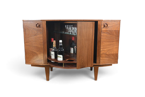 MID CENTURY BOOKCASE WITH ROTATING HIDDEN BAR