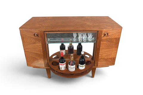 MID CENTURY BOOKCASE WITH ROTATING HIDDEN BAR