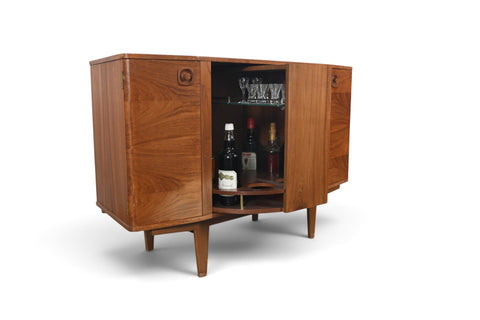 MID CENTURY BOOKCASE WITH ROTATING HIDDEN BAR