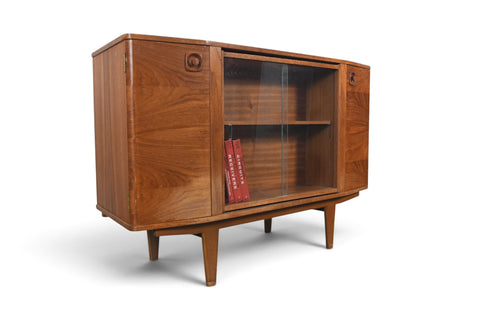 MID CENTURY BOOKCASE WITH ROTATING HIDDEN BAR