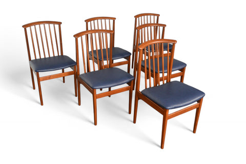 SET OF SIX SYLVE STENQUIST SPINDLE BACK DINING CHAIRS IN TEAK TOP-SIDE VIEW