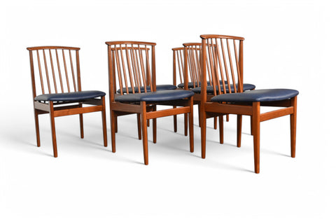 SET OF SIX SYLVE STENQUIST SPINDLE BACK DINING CHAIRS IN TEAK SIDE - EYE LEVEL VIEW