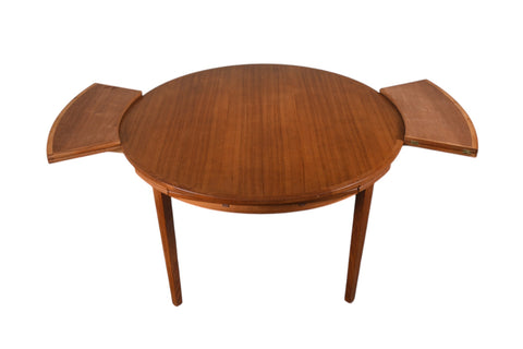 LOTUS / FLIP FLAP DINING TABLE IN TEAK BY DYRLUND