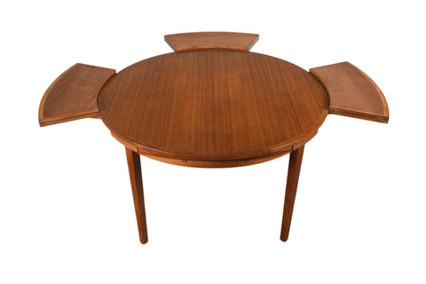 LOTUS / FLIP FLAP DINING TABLE IN TEAK BY DYRLUND