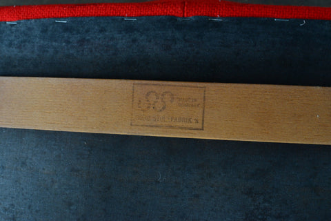 Detail of a Erik Wortz Dining Chairs, "Made in Denmark" stamp.
