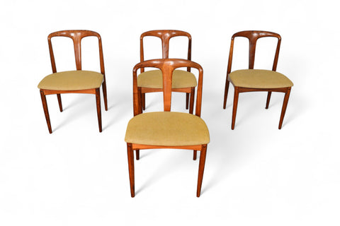 A set of four 'Juliane' dining chairs in rosewood with upholstered seats, designed by Johannes Andersen.