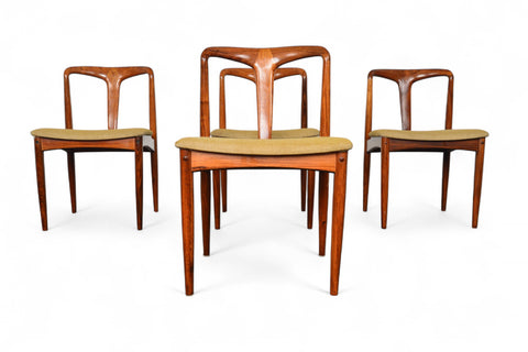 A set of four 'Juliane' dining chairs in rosewood with upholstered seats, designed by Johannes Andersen.