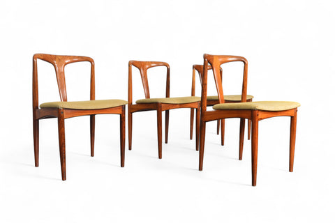 A set of four 'Juliane' dining chairs in rosewood with upholstered seats, designed by Johannes Andersen.