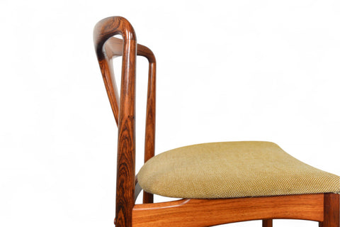 'Juliane' dining chair in rosewood with upholstered seats, designed by Johannes Andersen.