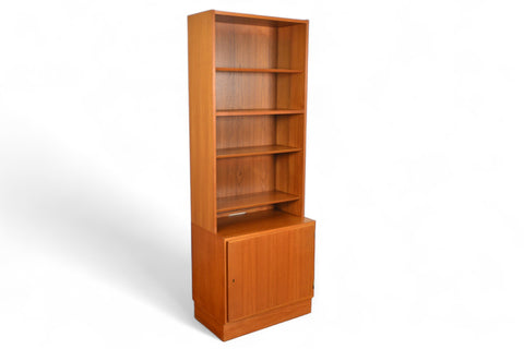 CARLO JENSEN NARROW TEAK BOOKCASE WITH LOWER LOCKING CABINET