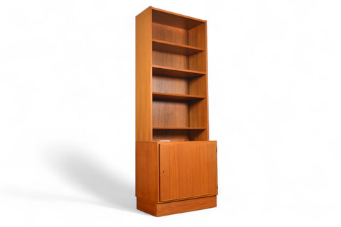 CARLO JENSEN NARROW TEAK BOOKCASE WITH LOWER LOCKING CABINET