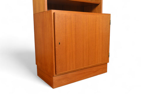 CARLO JENSEN NARROW TEAK BOOKCASE WITH LOWER LOCKING CABINET