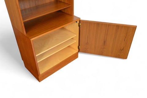 CARLO JENSEN NARROW TEAK BOOKCASE WITH LOWER LOCKING CABINET