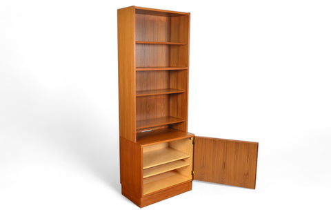 CARLO JENSEN NARROW TEAK BOOKCASE WITH LOWER LOCKING CABINET