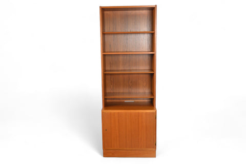 CARLO JENSEN NARROW TEAK BOOKCASE WITH LOWER LOCKING CABINET